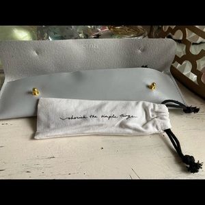 Black leather watch strap with gold clasp